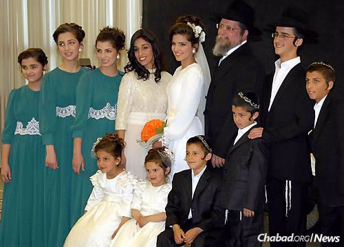 Rabbi Yossi and Michal Nachshon, and their family