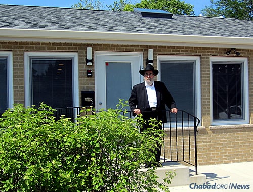 Rabbi Binyomin Scheiman outside his Illinois Chabad House, which serves the Jewish communities of Niles and Des Plaines.