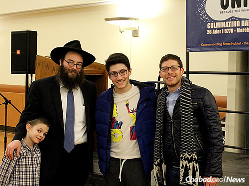 Students Akiva Aranoff and Eric Rosenn with Rabbi Levi Slonim, Chabad’s director of programming and development, and his son Mendel. (Photo: Chabad of Binghamton/D. Grafman)