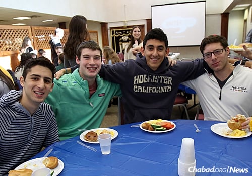 From left: Jake Salner, Cole Tobias, Evan Margolis and Eric Rosenn enjoy the kickoff brunch at the beginning of the pilot project. (Photo: Chabad of Binghamton/L. Appelbaum)
