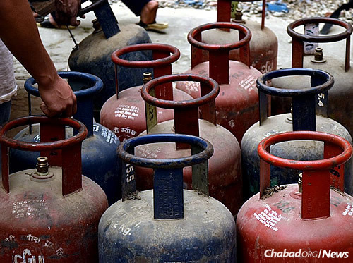Getting Passover goods to Nepal for the seders often presents challenges. This year, a trade embargo from India and severe traffic snarls on the Indian border have plunged the South Asian nation into a gas shortage, leaving it thirsting for petroleum used for cooking purposes. (Photo: Chabad of Nepal)