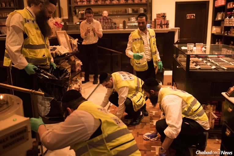 Volunteers from Zaka emergency services at the scene of a terrorist shooting in Tel Aviv that left four Israelis dead and 16 wounded.