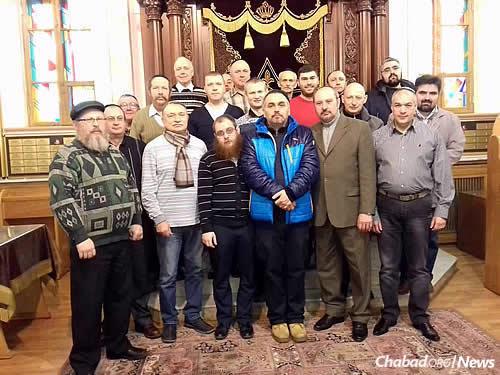 A group photo of Kolel Torah participants at the synagogue in Donetsk.