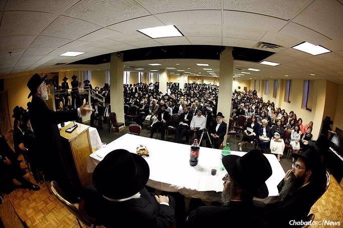 Rabbi Israel Meir Lau, left, former Ashkenazi chief rabbi of Israel and current chief rabbi of Tel Aviv, speaks to the newly ordained rabbis at the Rabbinical College of America in 2012. (Photo: Chaim Perl)