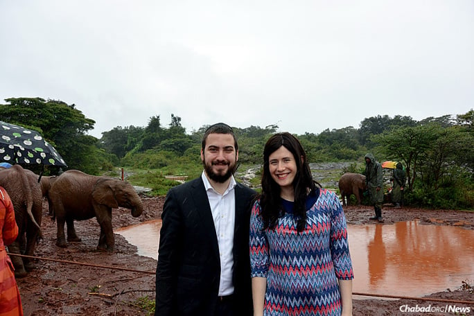 Rabbi Avromy and Sternie Super will move to Nairobi, Kenya, this fall to lead the Nairobi Hebrew Congregation and establish Chabad-Lubavitch of Kenya. They are seen here at an elephant orphanage in Nairobi&#39;s National Park.