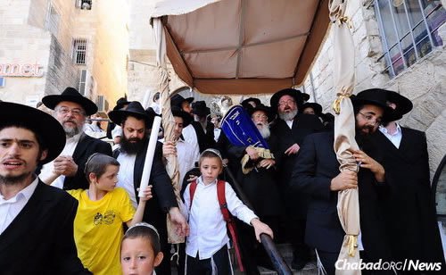 The writing of the sixth “children’s Torah scroll” was finished last week in Jerusalem. Celebrants then carried the scroll through the Old City to the Western Wall (Kotel).