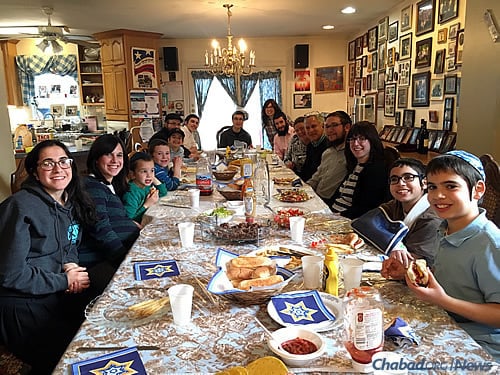 Some of the local Weinstein children and grandchildren gather for a weekly family dinner. Students are often invited for all kinds of meals, not just on Shabbat.