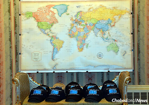 Marking communities around the world as well; blue caps highlight the Torah Gemach. (Photo: Alex Bodnar)