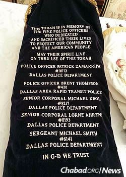 On the cover are the names, badge numbers and ranks of the slain officers. (Photo: Alex Bodnar)