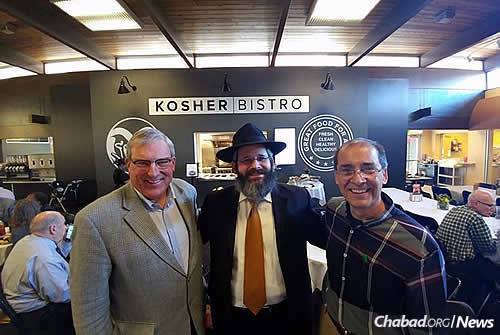 The rabbi with City Councilman Ray Martinez, left, and Fort Collins Mayor Wade Troxell (Photo: Kasen Schamaun/The Rocky Mountain Collegian)