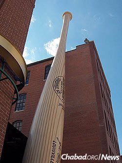 A giant baseball bat adorns the outside of Louisville Slugger Museum &amp; Factory in downtown Louisville. (Photo: Wikimedia Commons)