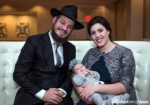 Rabbi Shloime and Shoshi Litvin, and their baby daughter (Photo: Elisheva Golani)