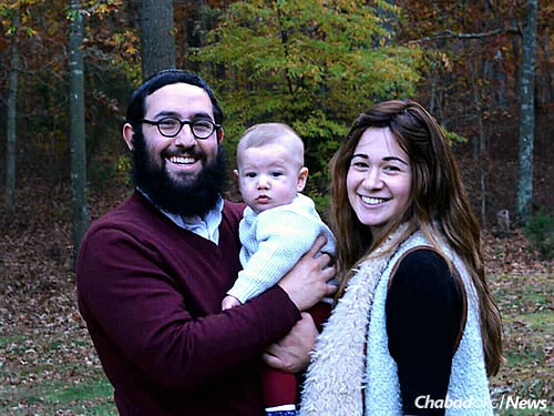Rabbi Meir and Shaina Rapoport, with their son Mendel