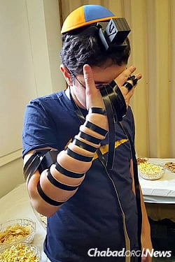 Boys 13 and older had the opportunity to wrap tefillin. (Photo: CTeen)