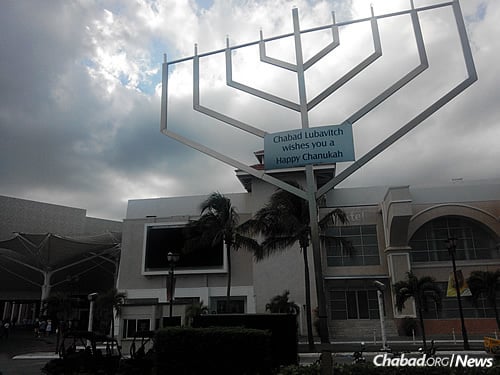 A huge menorah stands in front of the Chabad Jewish Center of Cancun.