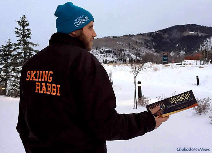 Rabbi Yudi Steiger, co-director of Chabad Lubavitch of Park City, Utah, has been handing out menorah kits at the ski slopes for residents and tourists, who flock to the area over winter break.
