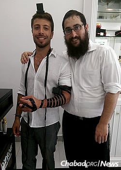 And wrapping tefillin with the locals