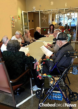 Rivky Hershkovich teaches a class at an assisted-living facility.